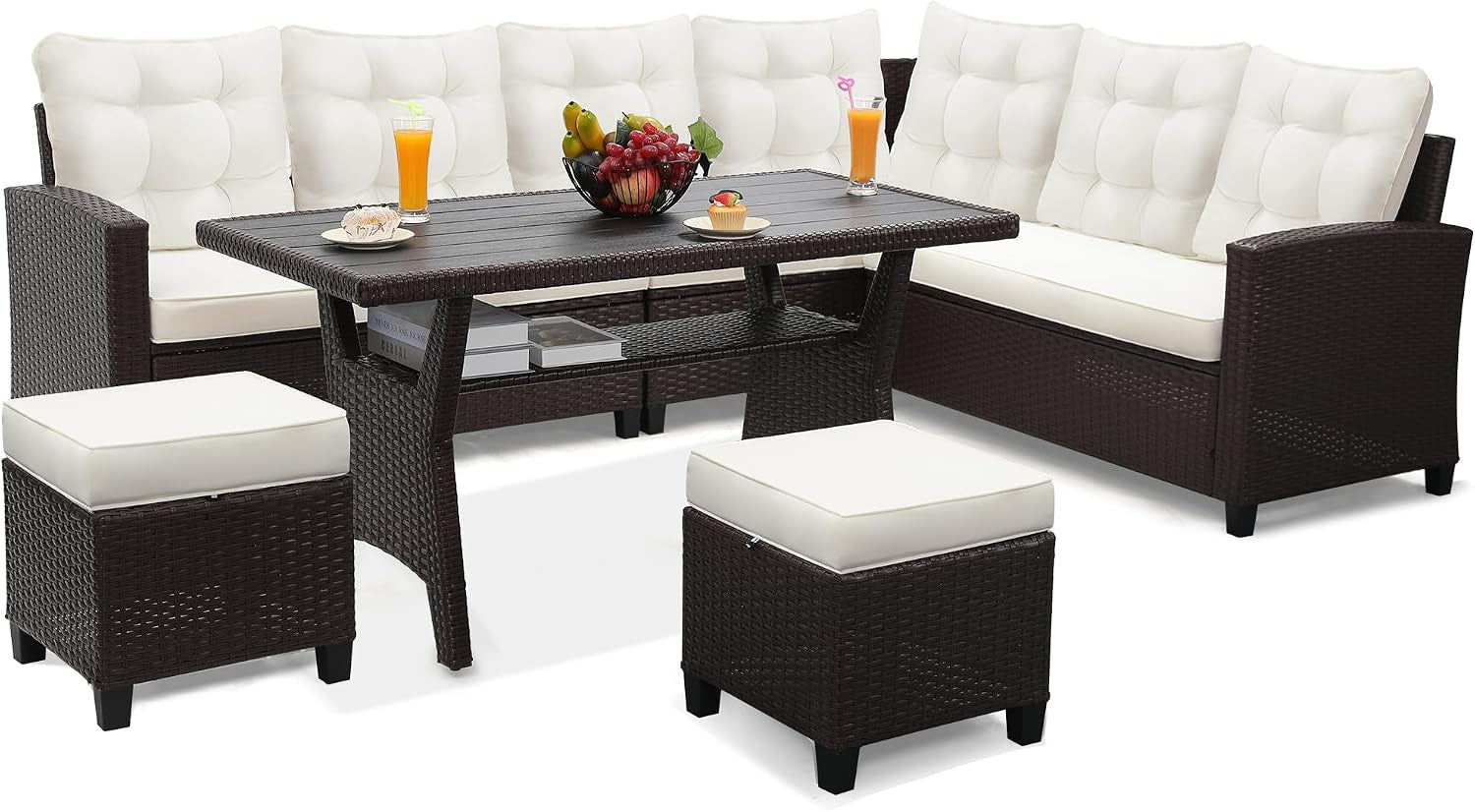 Dark brown wicker modular patio set with white tufted cushions, rectangular table and two ottomans.