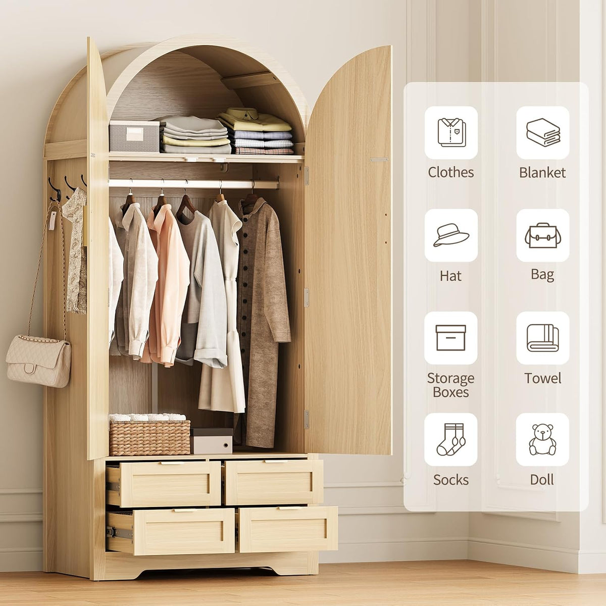 Interior view of natural wood wardrobe showing hanging rod, arched top shelf and three side hooks with clothing displayed