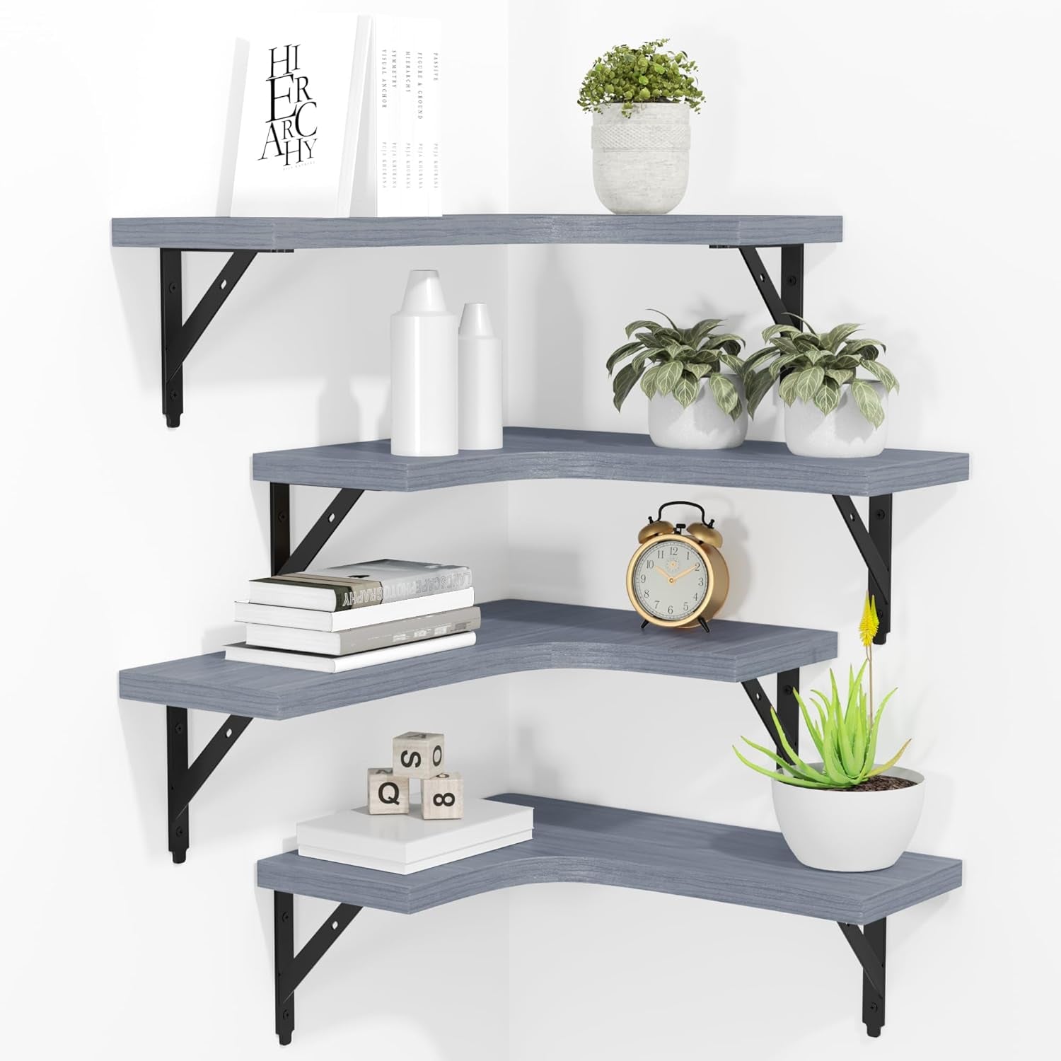 Four light gray-blue corner shelves with black metal brackets, accessorized with small plants and books.