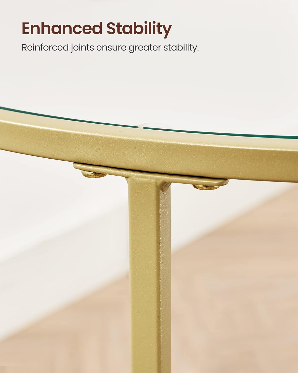 Tight close-up of a reinforced joint where a vertical leg meets the round top frame.