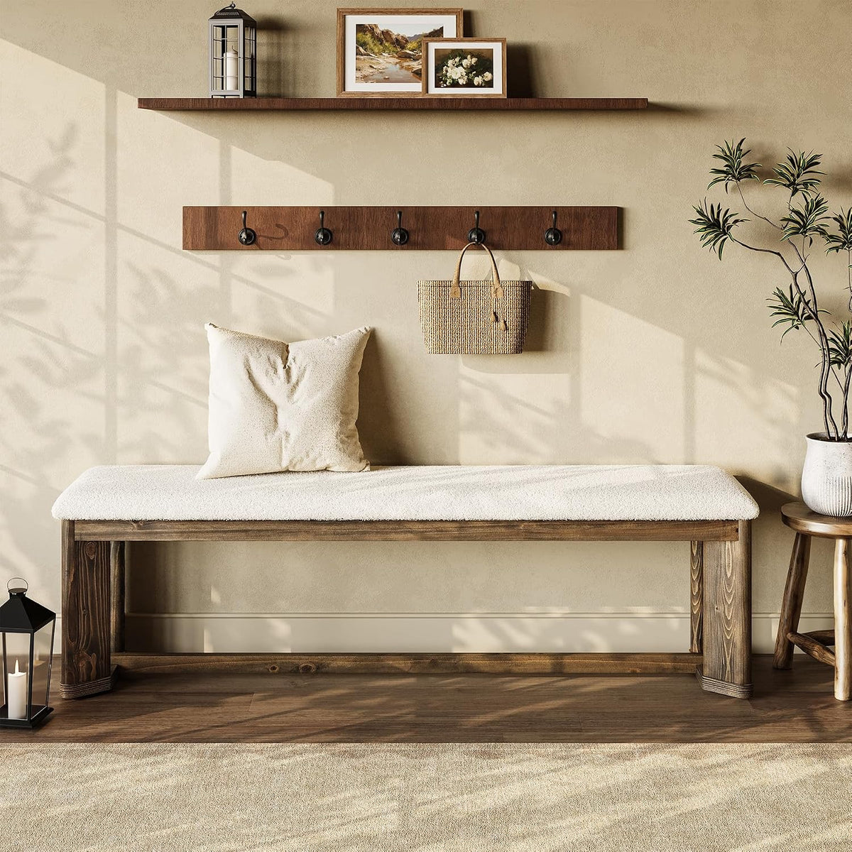 Long fur-topped bench beneath a floating shelf and wall hooks, woven tote hanging and a potted plant at right