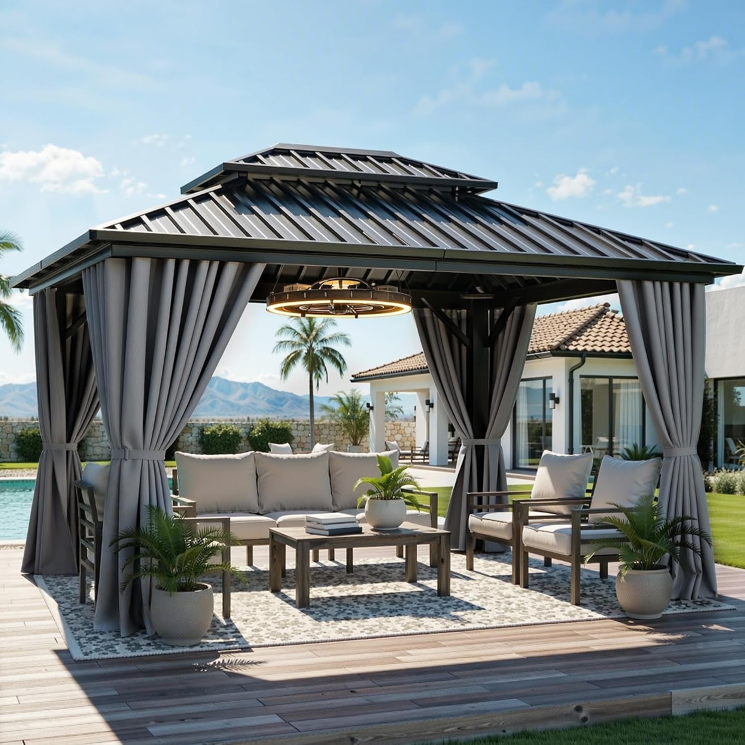Daytime poolside gazebo with gray curtains tied back and contemporary lounge furniture under a double-tiered metal roof.