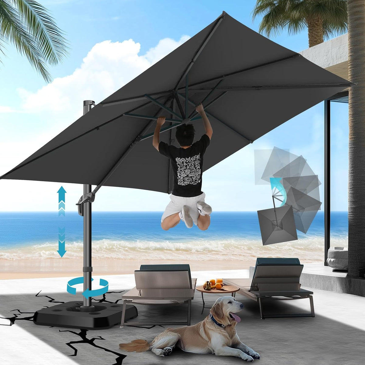 Dark gray cantilever umbrella tilted over loungers with person jumping and beach visible beyond