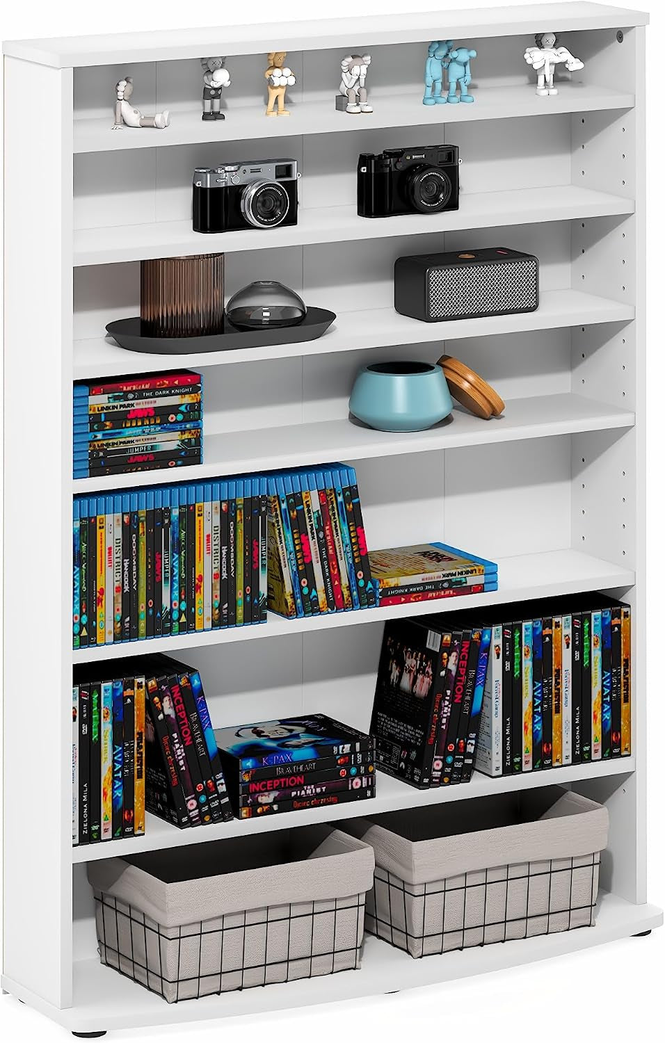 White slim media tower front view filled with DVDs, decor pieces and two wire storage baskets on the bottom shelf.