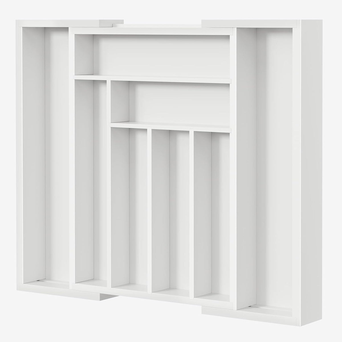 Three-quarter view of a white expandable cutlery organizer showing stepped top shelves and vertical divider slots.