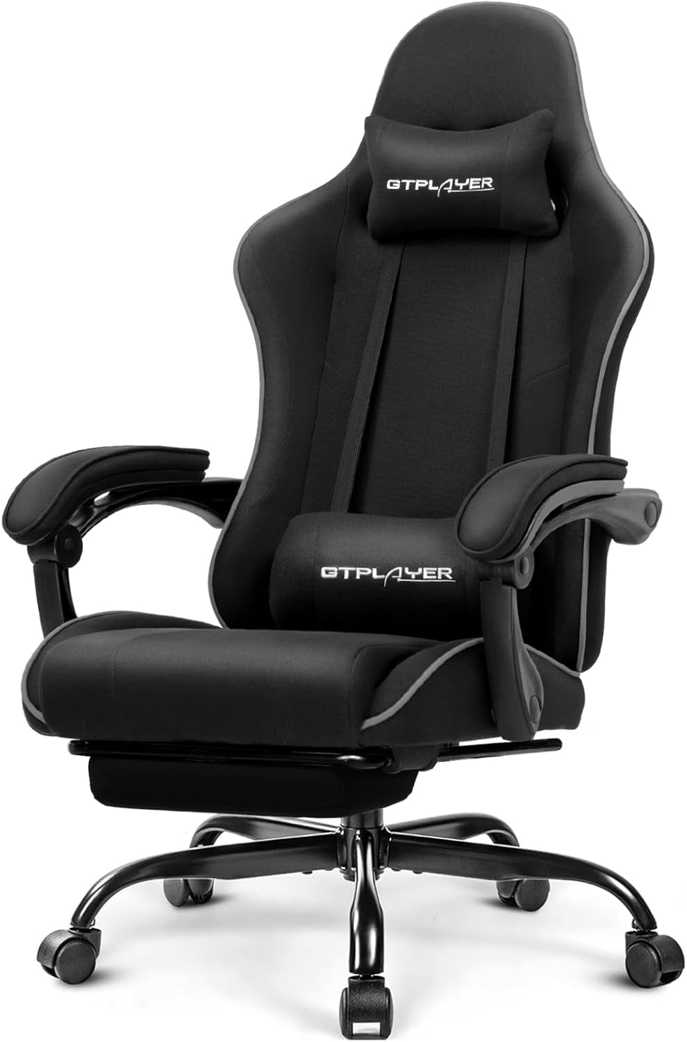 Studio three-quarter view of all-black gaming chair with matching pillows and chrome five-star caster base