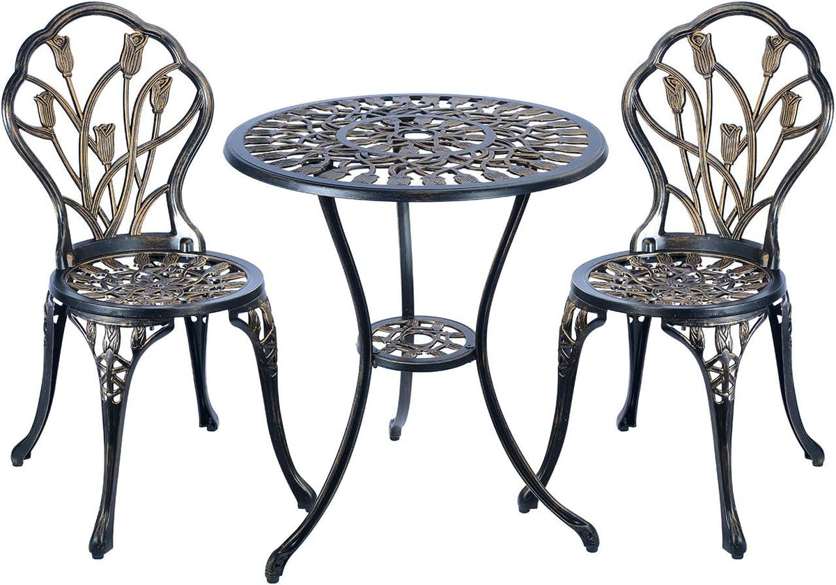 Three-piece cast aluminum bistro set: round filigree table with umbrella hole and two matching floral-back chairs on white