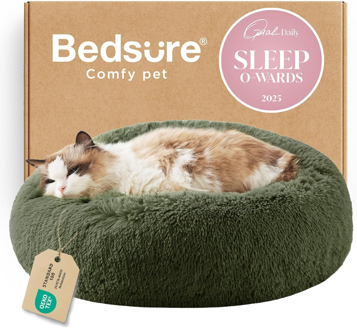 Fluffy cream-and-brown cat resting in an olive green round plush donut bed
