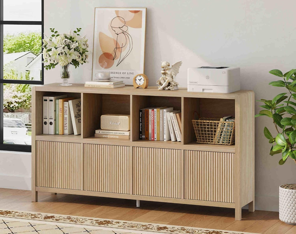 Low eight-cube wooden storage unit with four grooved doors, open upper cubbies styled with books and decor