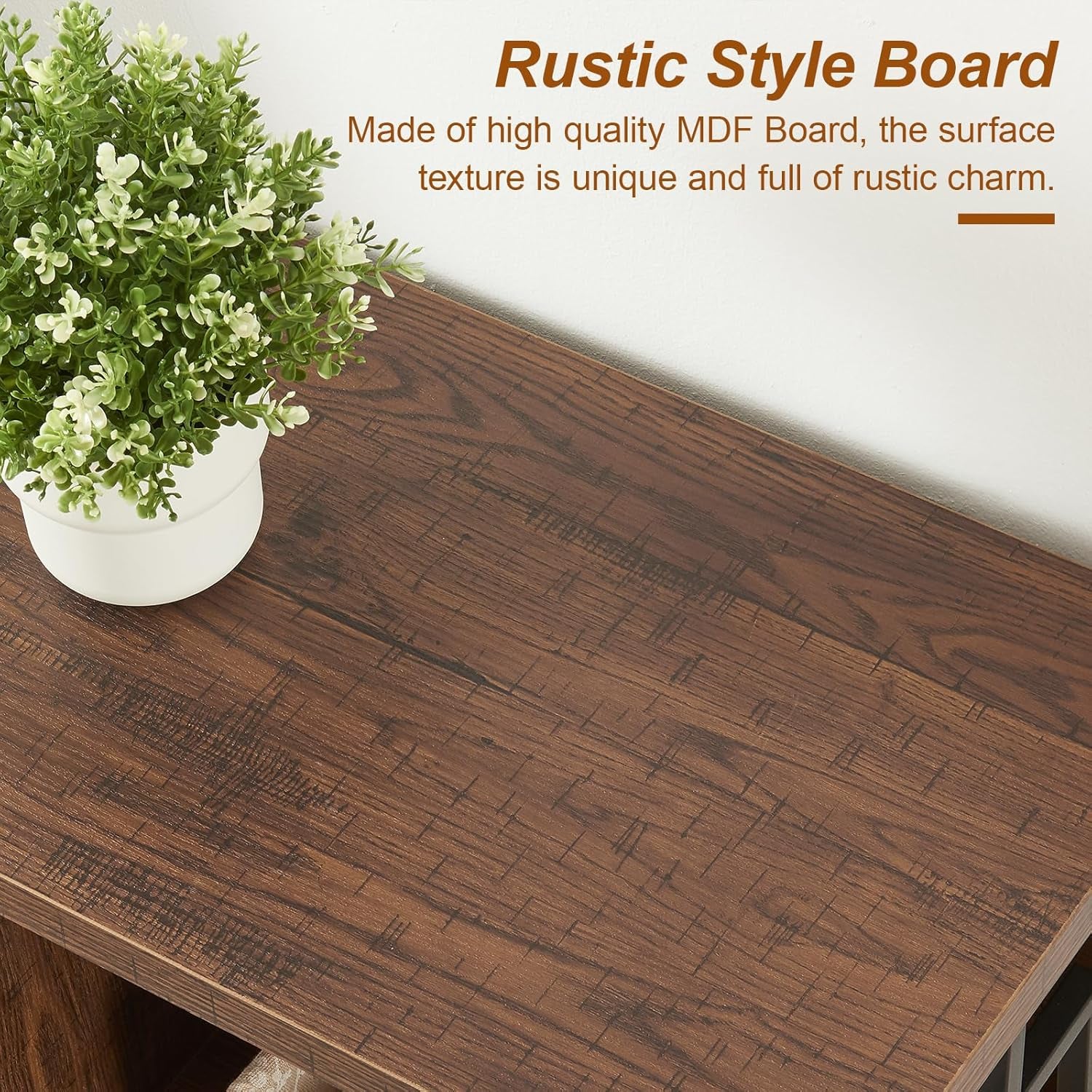 Rustic brown console table with lower shelves holding books and decorative boxes, straight-on living room view