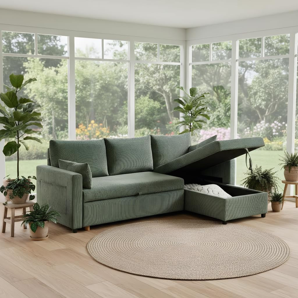 Green corduroy sectional with chaise lifted to reveal storage compartment in a bright room with plants.