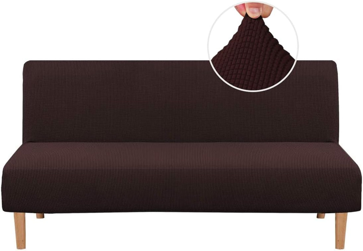 Front view of a slim armless sofa covered in a dark brown textured small-check slipcover