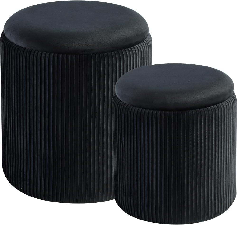 Black round ottoman pair with smooth tops and narrow vertical pleats on the sides