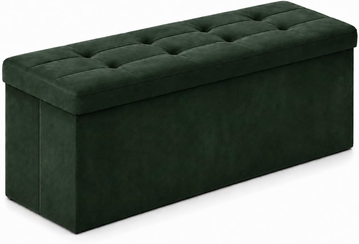 Long rectangular tufted storage bench in deep green shown at a three-quarter angle