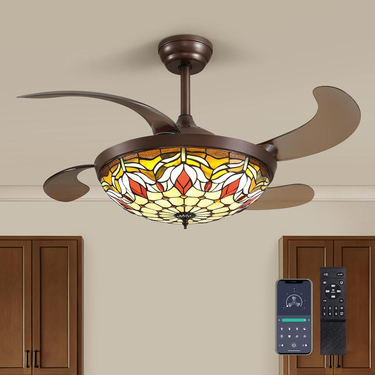 Angled view of the stained-glass ceiling fan installed over kitchen cabinets with a smartphone app and remote shown.