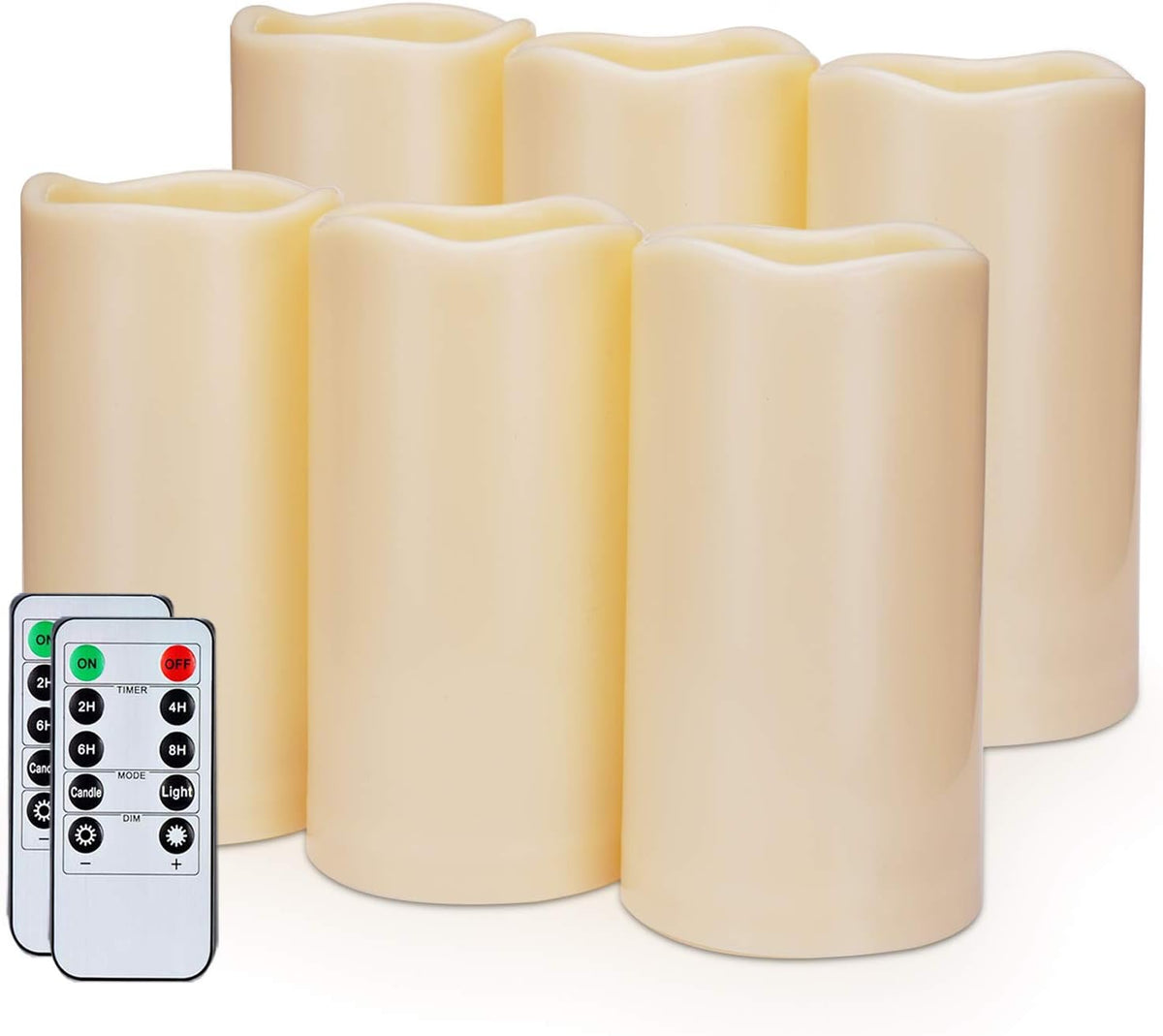 Close-up of six ivory resin pillar candles with two 10-key remote controls visible at the lower left