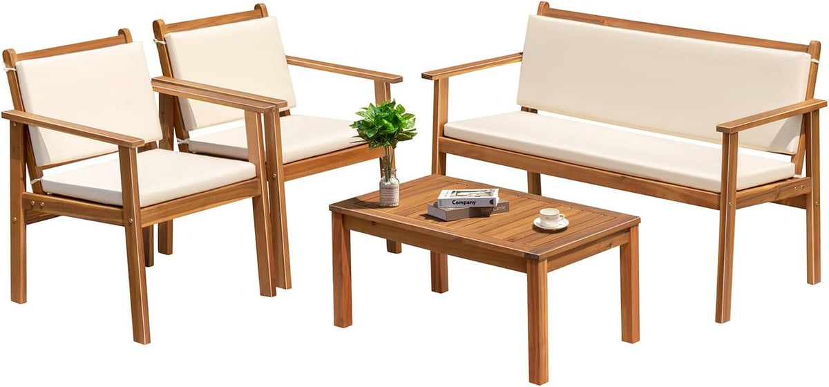 Acacia wood 4-piece patio set with white cushions on a plain background, three-quarter front view