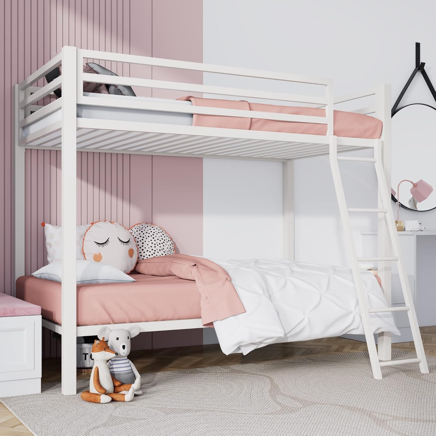 White twin-over-twin bunk bed with ladder in a pink-and-white children's bedroom, stuffed toys on floor
