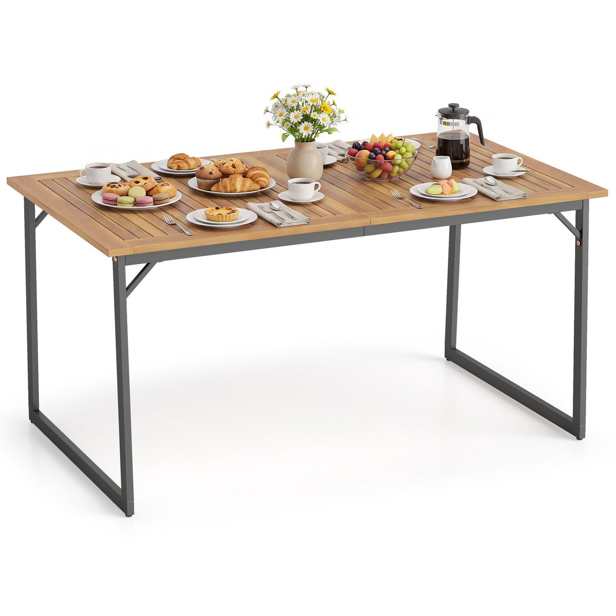 Slatted patio table arranged with plates, cups, pastries, fruit, a flower vase and a coffee press.