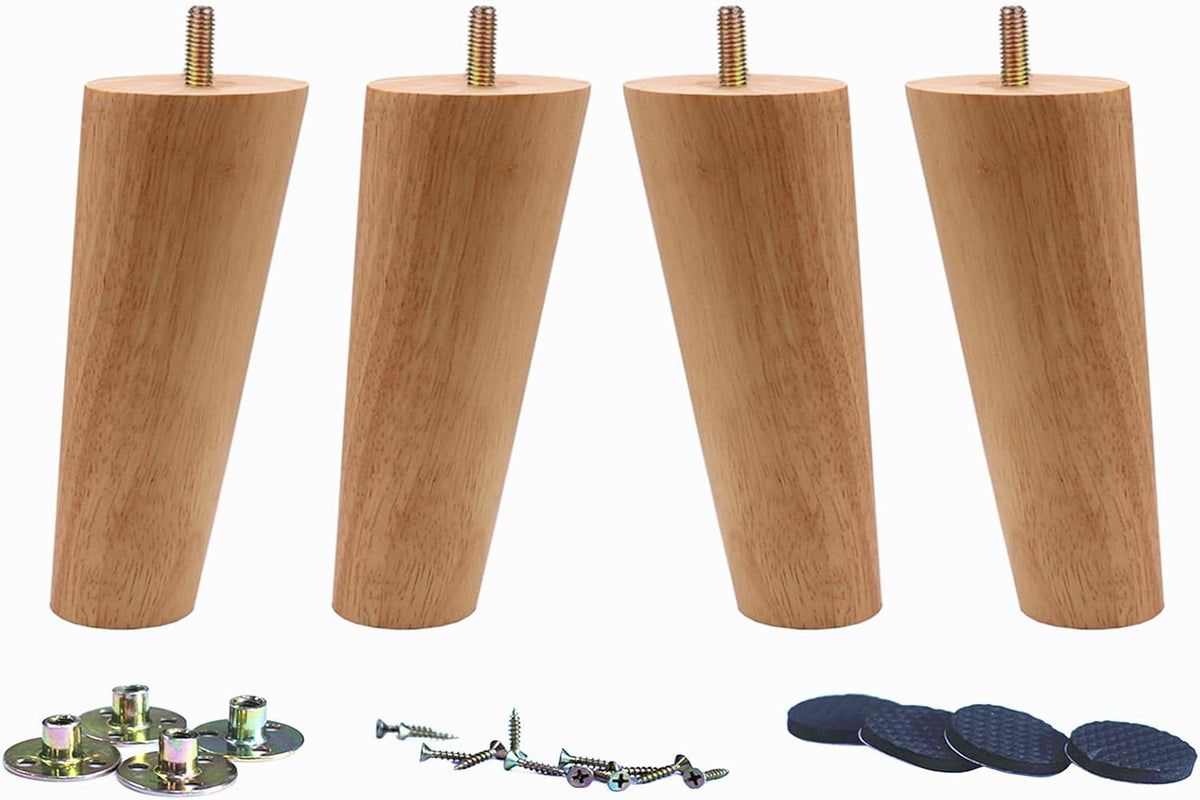 Set of four wooden tapered legs with hardware spread beneath: metal plates, assorted screws and black adhesive pads