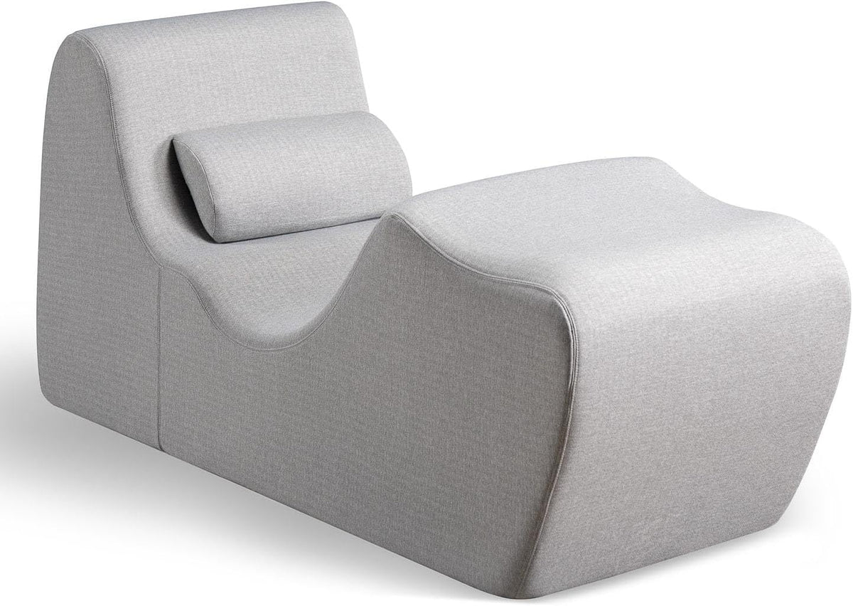 Light grey zero-gravity chaise lounger angled front-right studio view with matching lumbar pillow