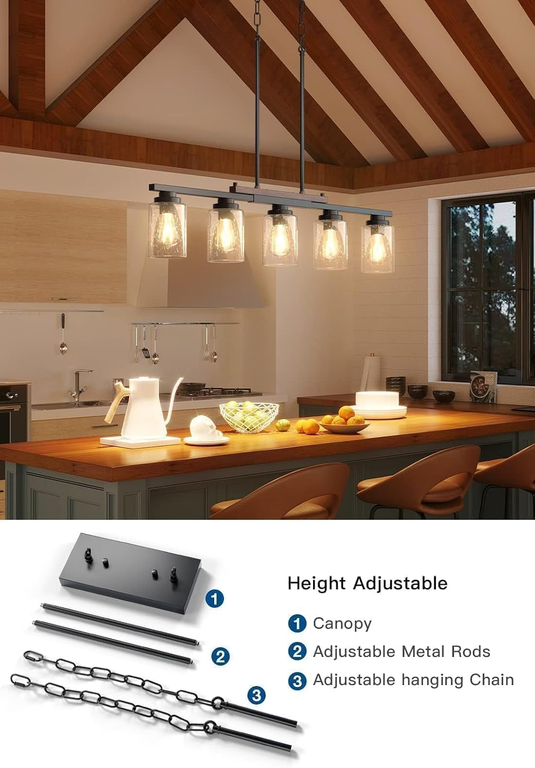 Lit five-light pendant hanging over a wood-topped island in a vaulted-ceiling kitchen with warm ambient lighting.