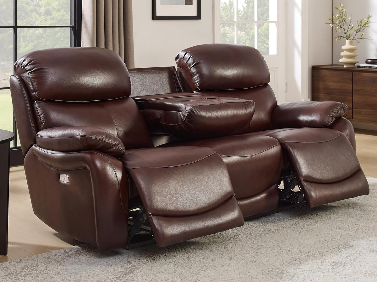 Brown leather reclining sofa with center drop-down table and both footrests extended in a living room.
