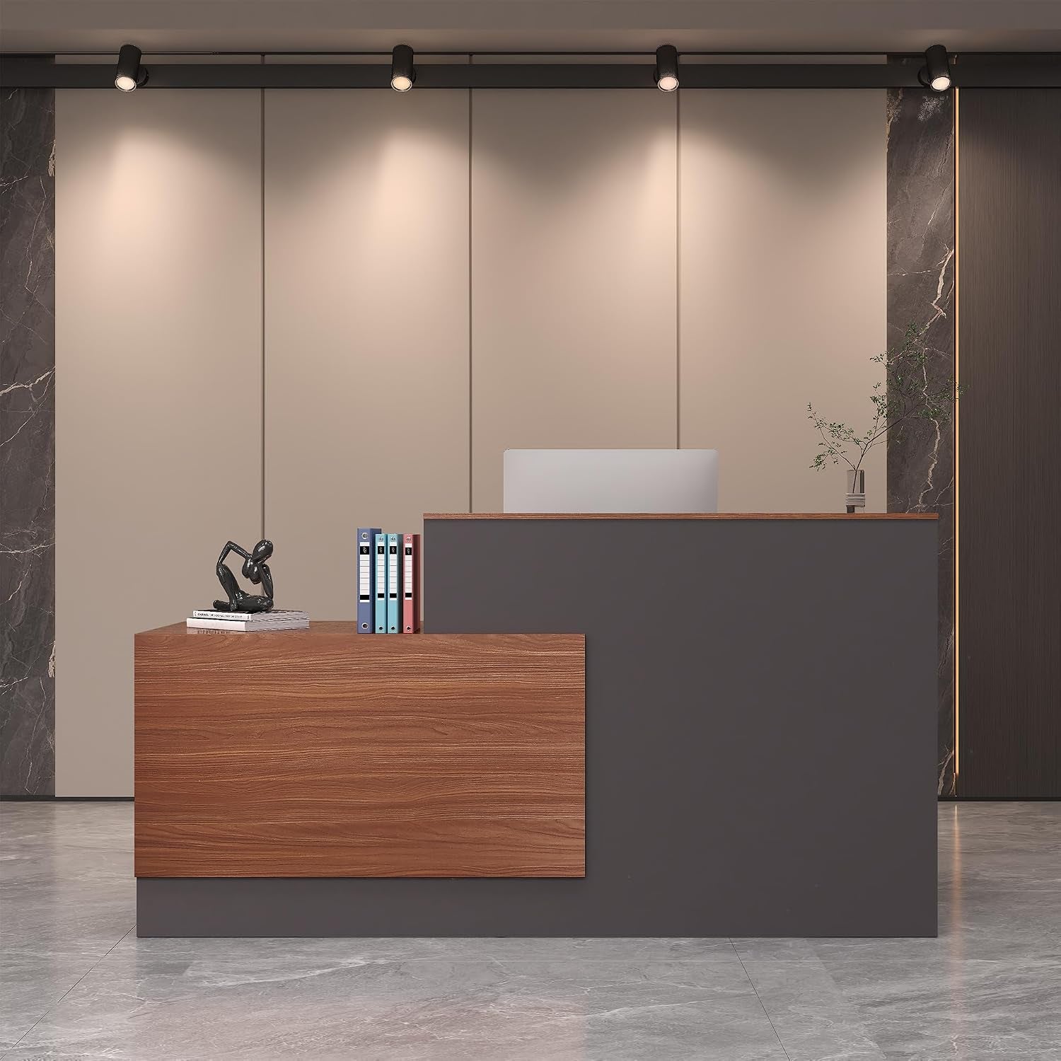 Front view of a walnut-and-slate L-shaped reception desk set against beige and marble panel walls.