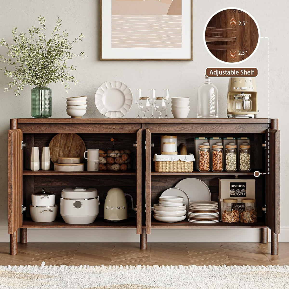 Open cabinet interior staged as pantry with jars, stacked plates and small appliances on two shelves.