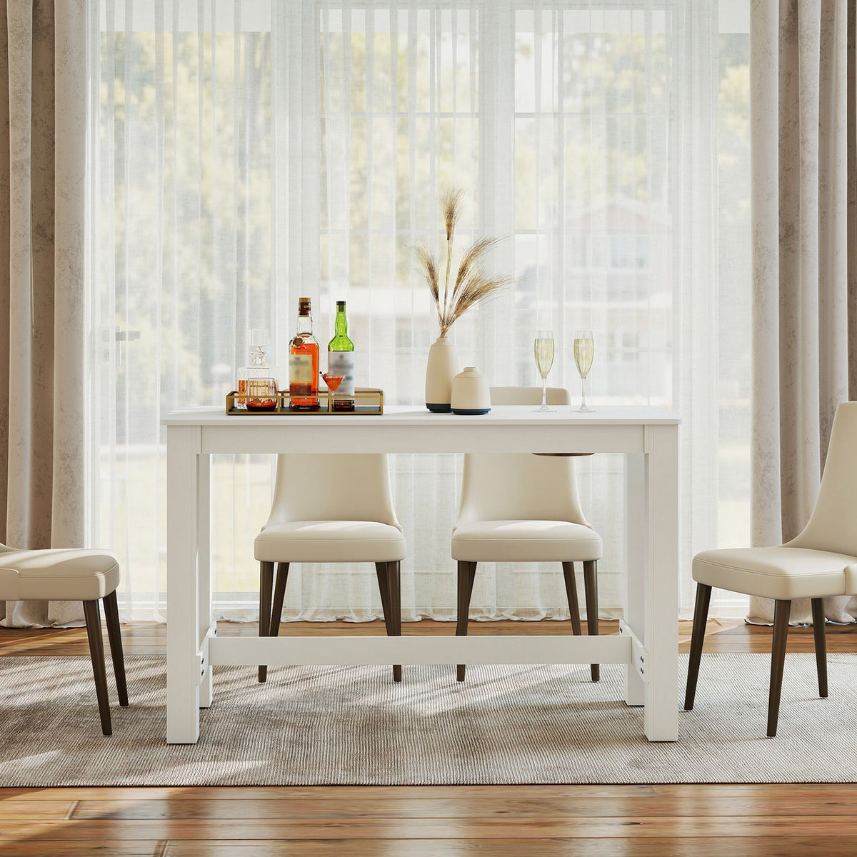 White rectangular table shown straight on with chairs in a bright room