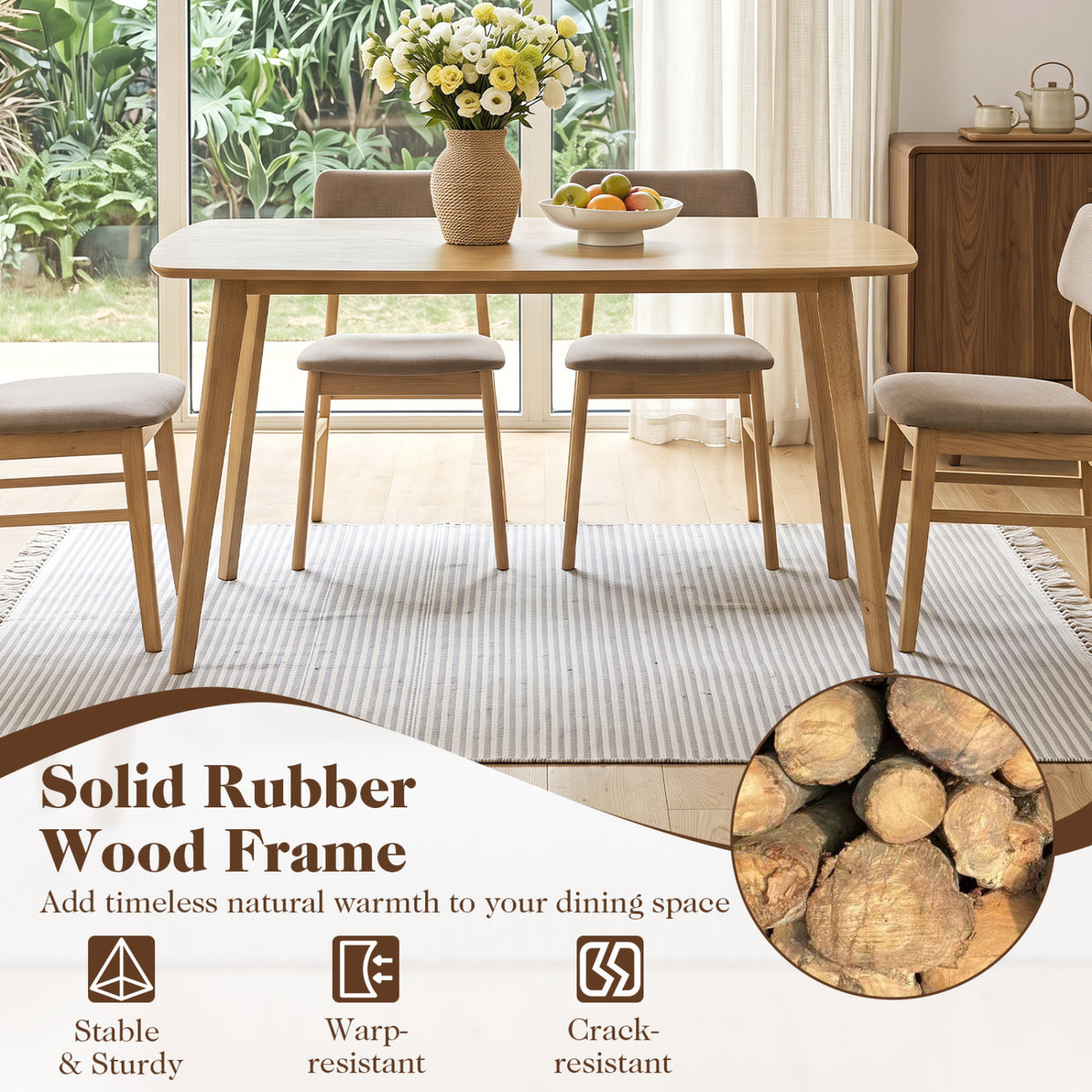 Natural wood dining table surrounded by chairs in a bright dining room, with flowers and fruit on the tabletop.