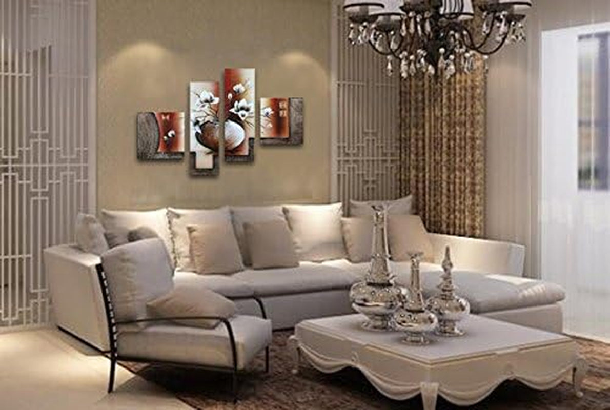 Four-panel canvas shown above a cream sofa in an elegant living room setting with chandelier and ornate coffee table.
