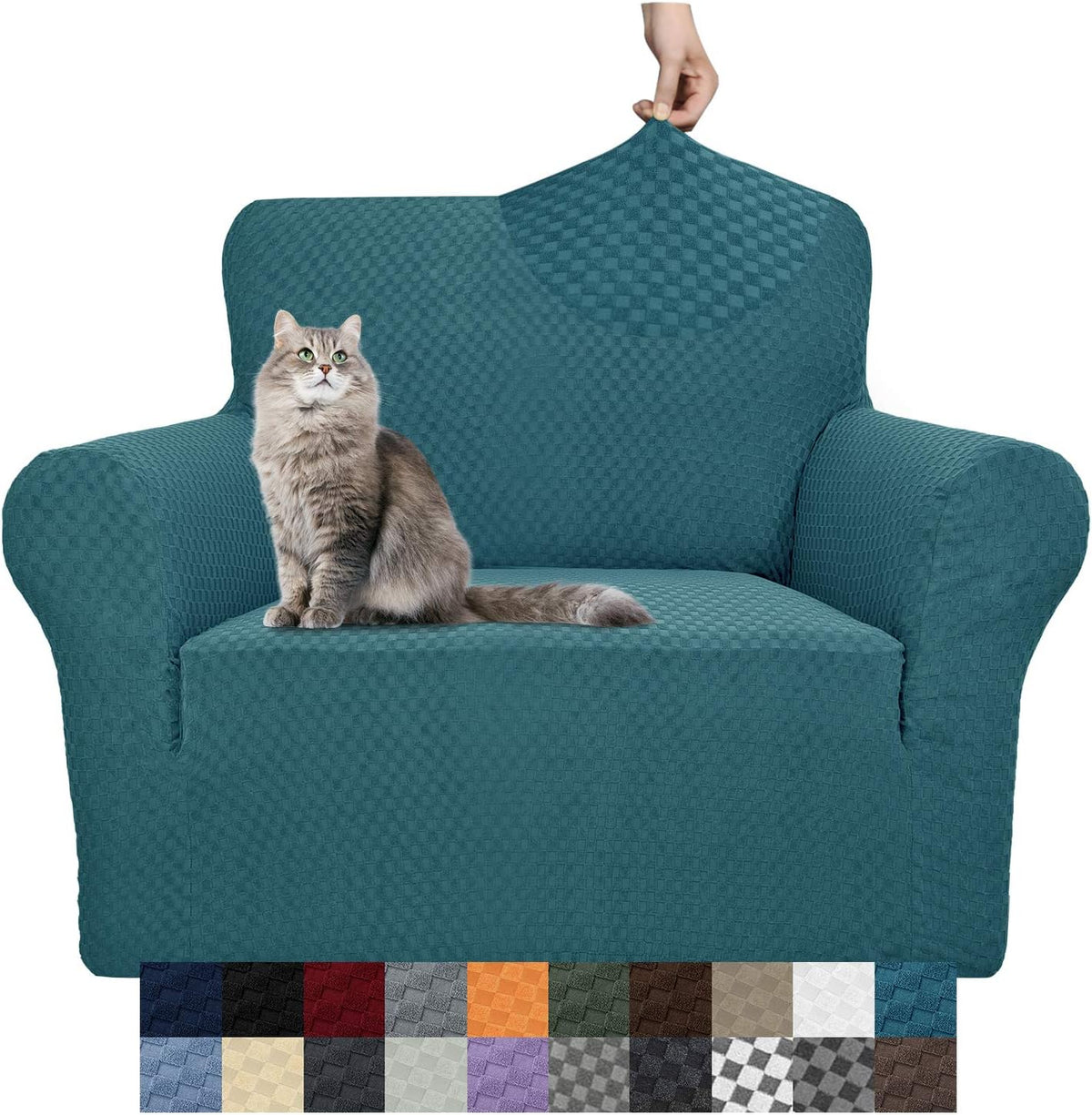 Teal stretch sofa cover fitted on an armchair with a gray cat on the seat and a hand stretching the fabric at the back.