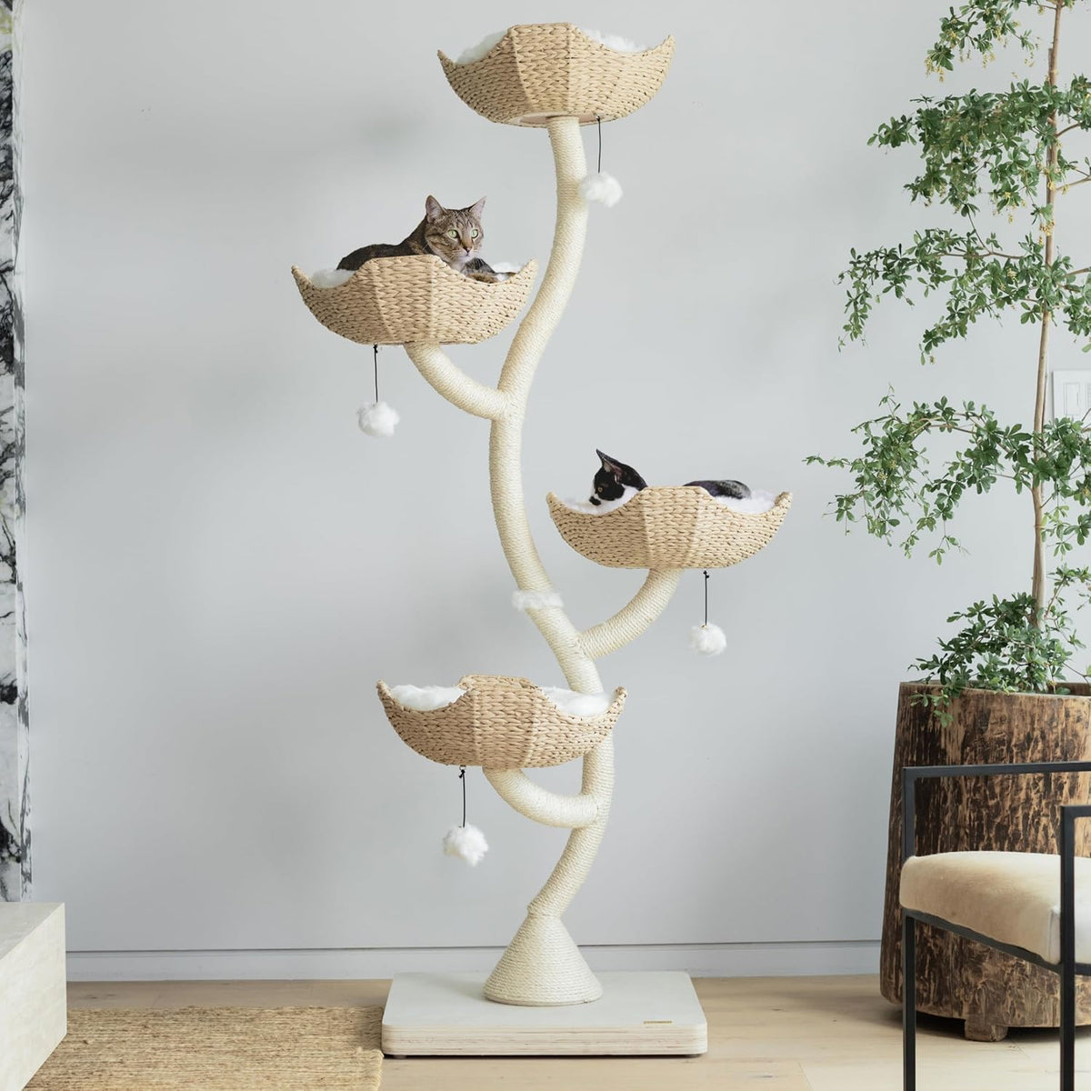 Tall rope-wrapped cat tree with multiple hand-woven baskets in a living room setting, full-height side view