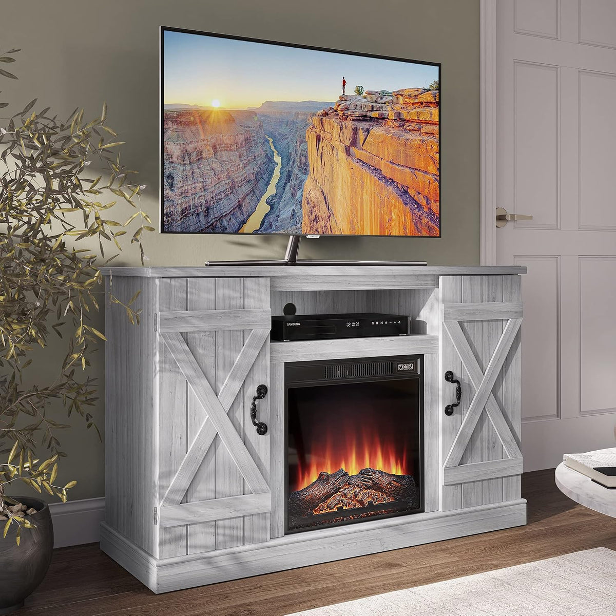 Cropped view highlighting the right barn-door panel, decorative handle and fireplace glow beneath the shelf