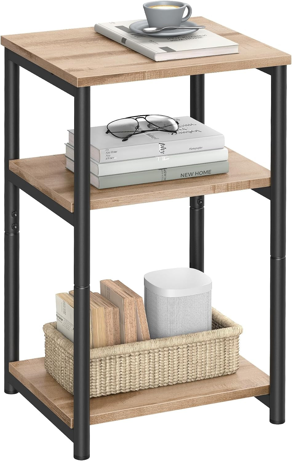 Three-tier rectangular end table with light wood shelves and black metal legs, styled with books, glasses and a woven basket.
