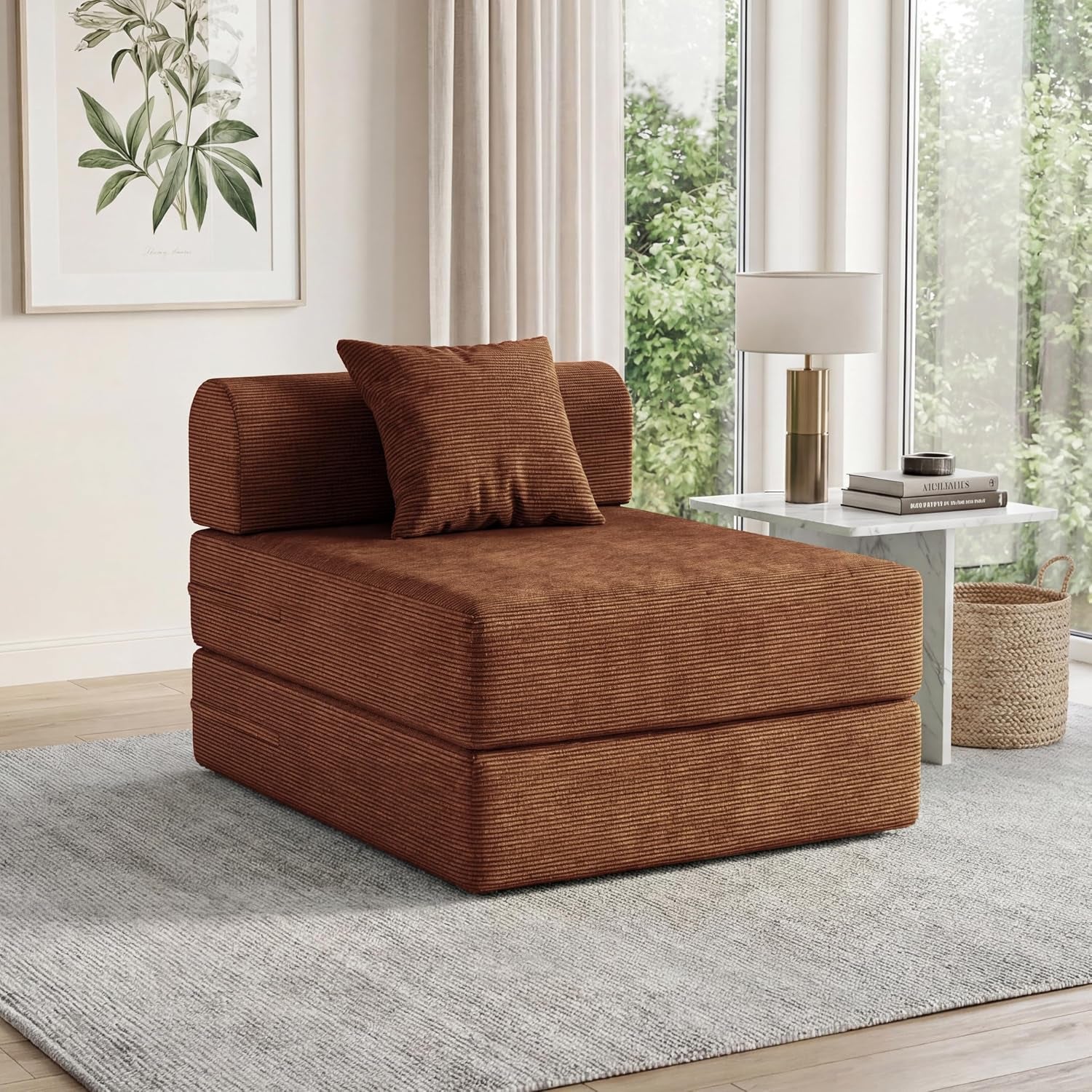 Single rust-brown corduroy folding sofa configured as a chaise with matching pillow in a sunlit room