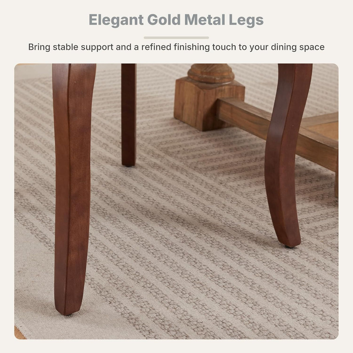 Close-up of two curved wooden chair legs and table legs on a patterned rug