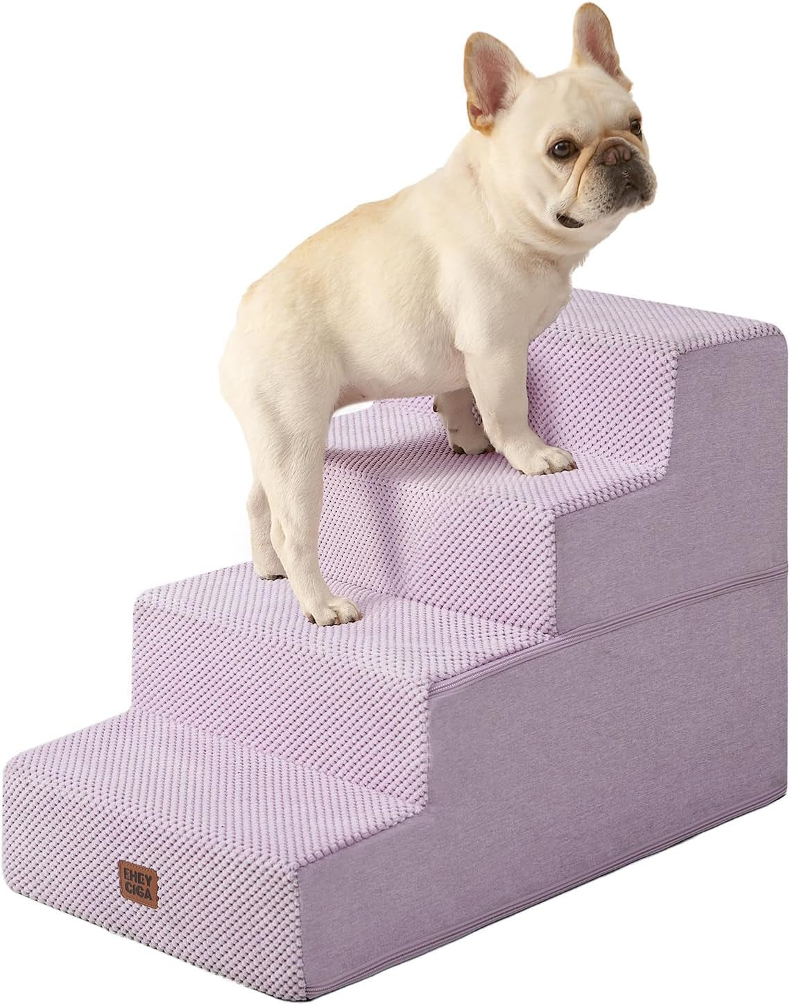 Small cream French bulldog standing on a four-step lavender textured pet stair
