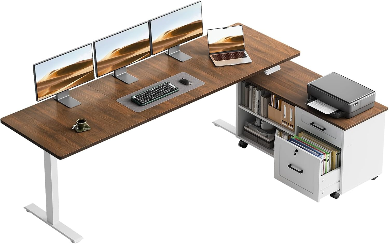 Walnut L-shaped standing desk with white mobile cabinet and three monitors on top