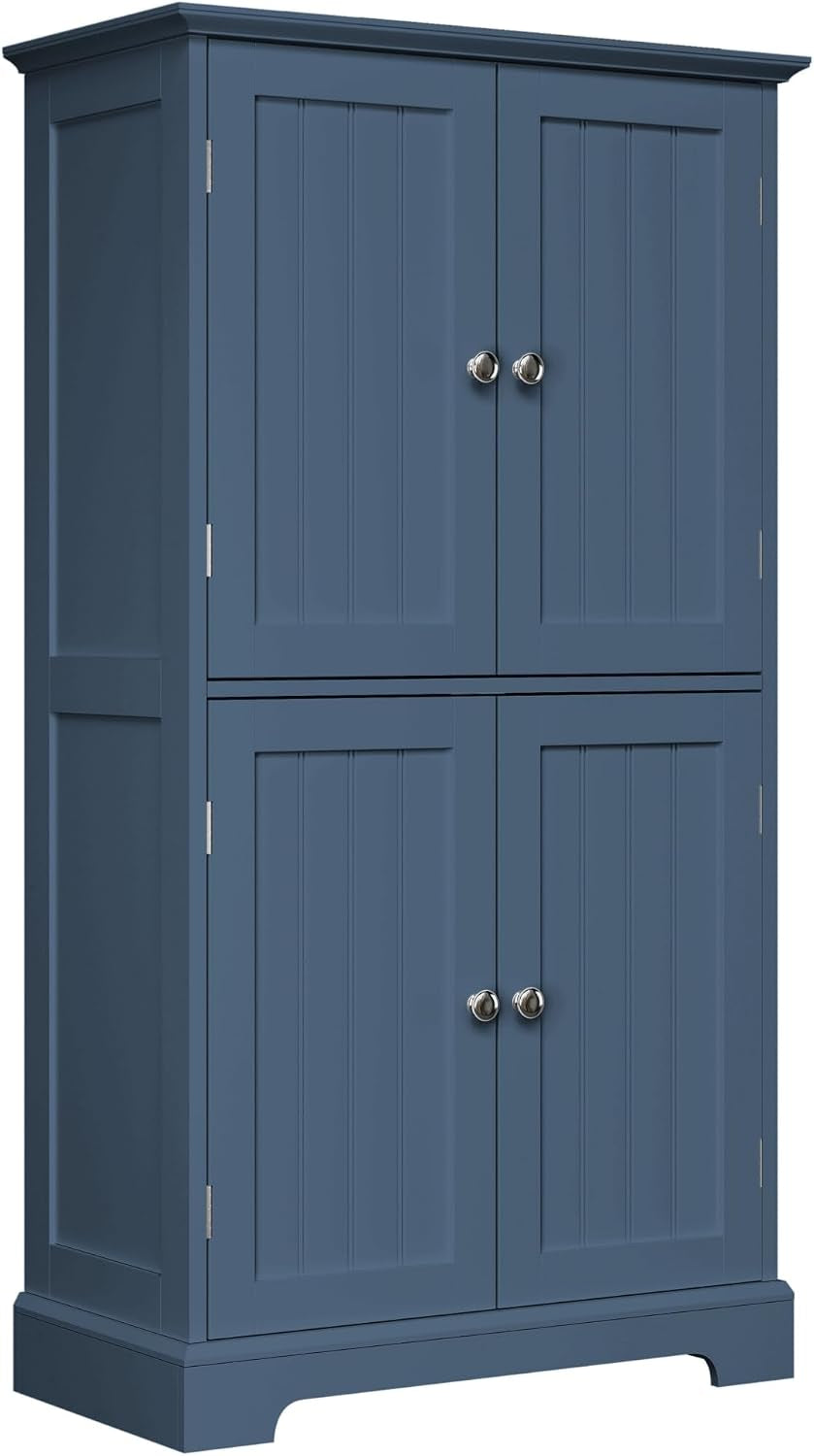 Tall four-door cupboard painted matte navy blue with round metal knobs and paneled doors.