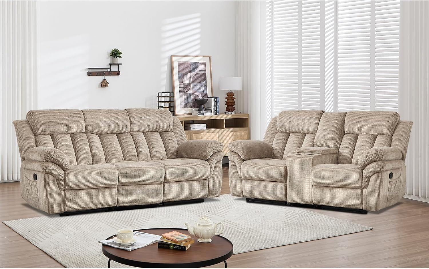 Light brown reclining three-seat sofa and two-seat loveseat arranged straight front in a staged living room with coffee table