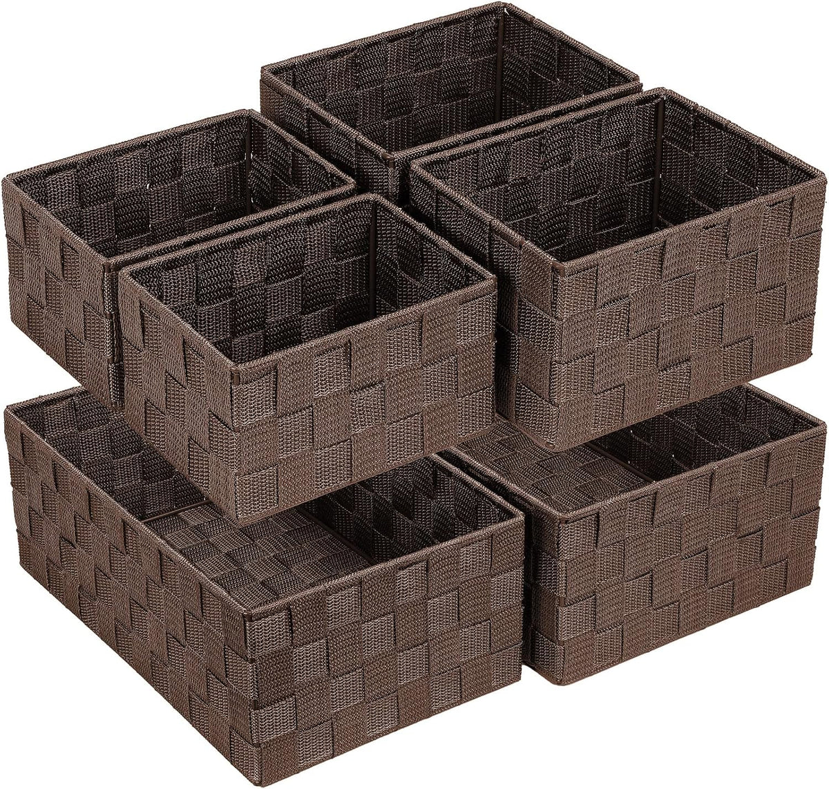 Close-up of brown woven storage baskets stacked together on a white background, front angle