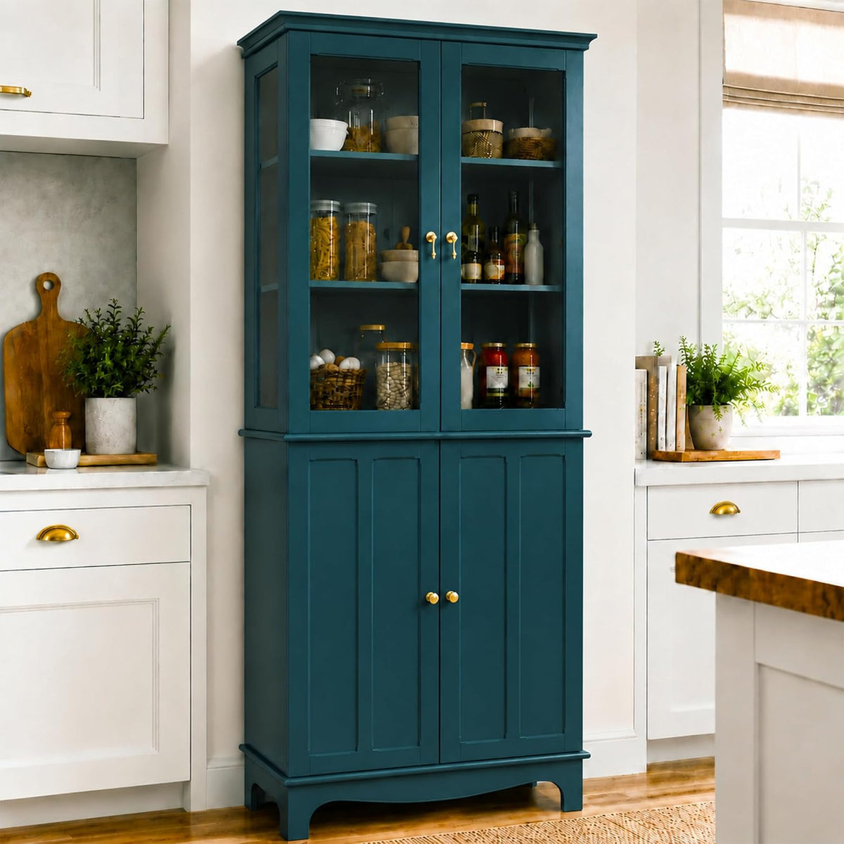 Kitchen vignette close-up of the cabinet showing glass display doors filled with jars and brass handles