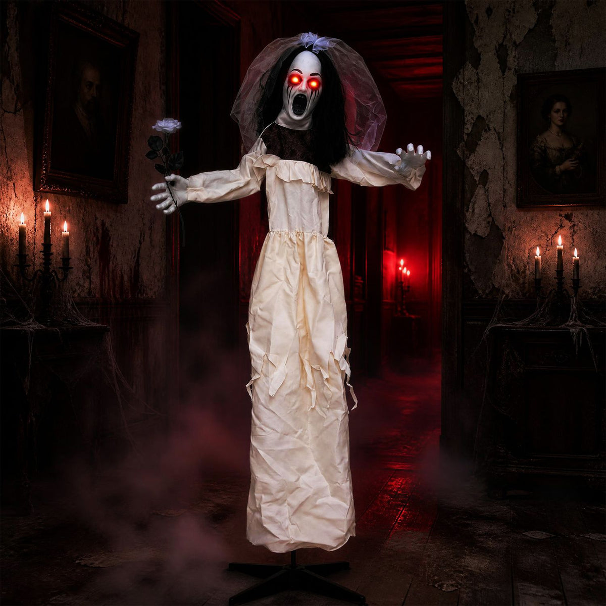 A ghostly bride animatronic in a tattered white dress holds a flower in a dim, candlelit room.