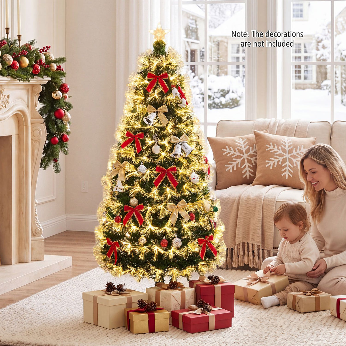Glowing Christmas tree with red and gold bows in a living room with a family