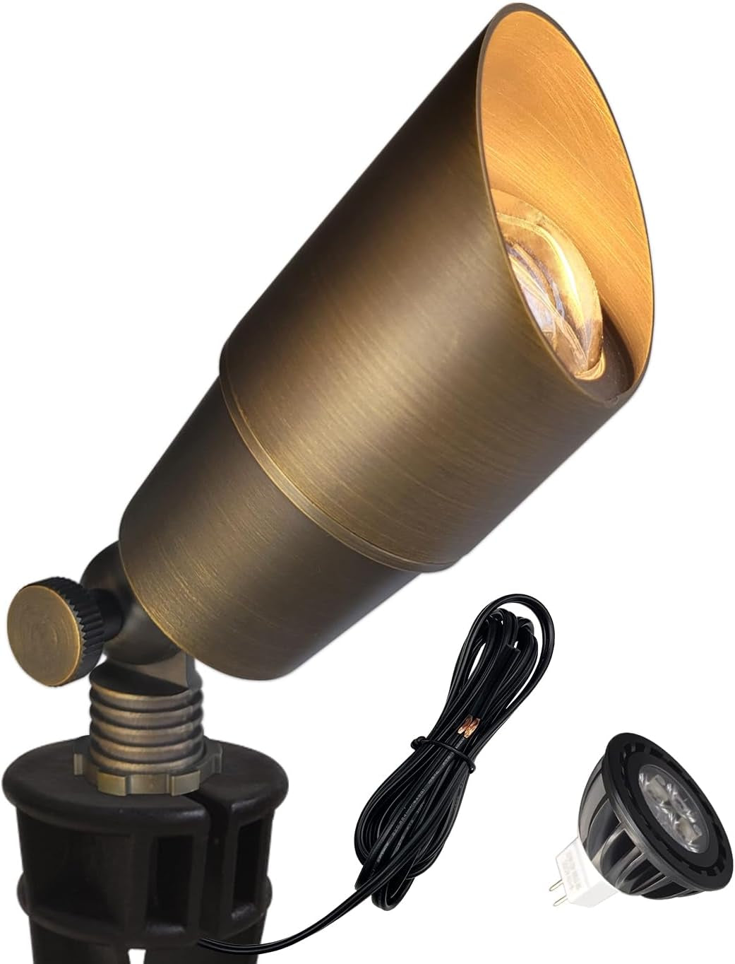 Close-up of a single bronze spotlight on its stake with black cable and a separate MR16 LED bulb.