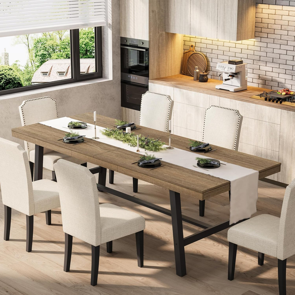 Rustic brown wood extendable table with black metal legs set in a dining kitchen with upholstered chairs.