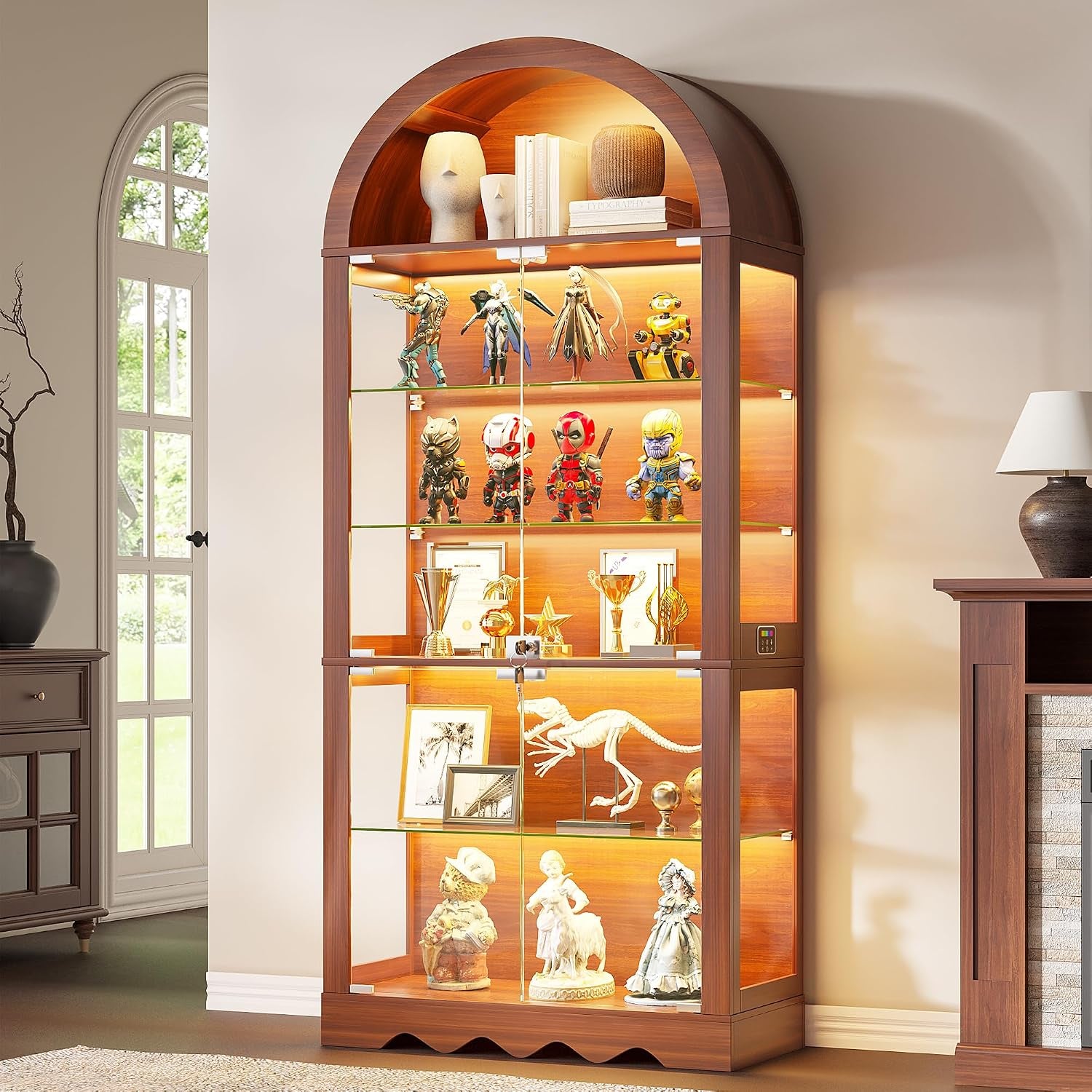 Arched wood-tone display cabinet with warm LED lighting, glass shelves showing figurines and trophies.