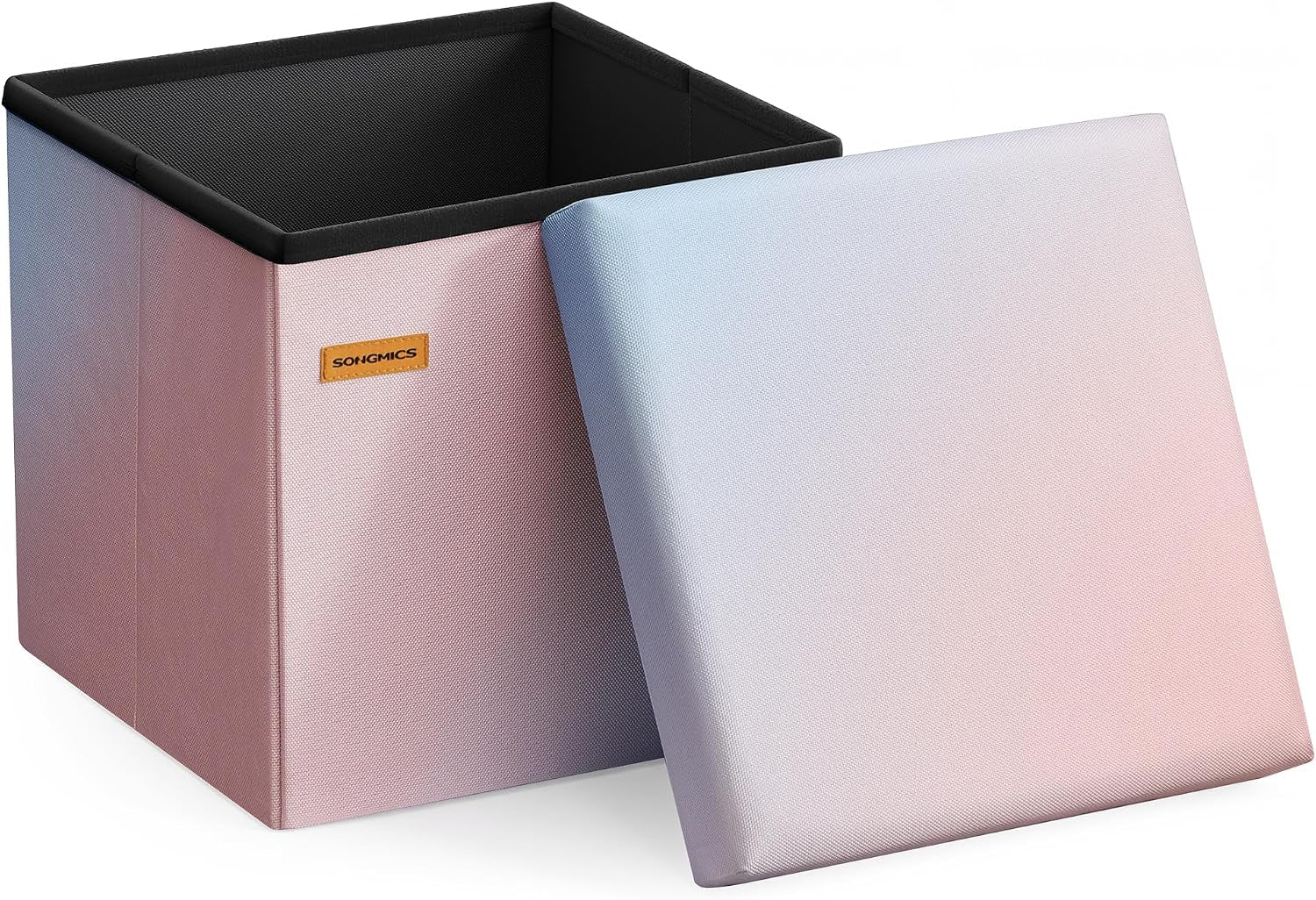 Square foldable storage ottoman with lid leaned forward; pink-to-blue gradient fabric exterior and black interior.